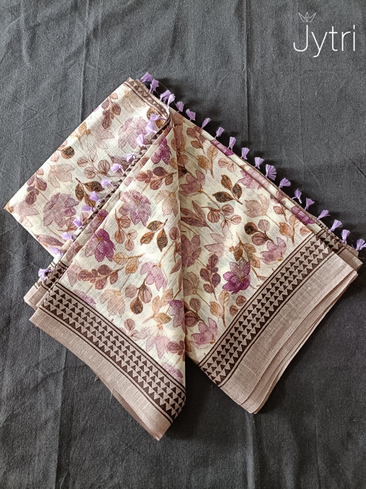 Off White Jute Cotton Saree with Lavender Tassels