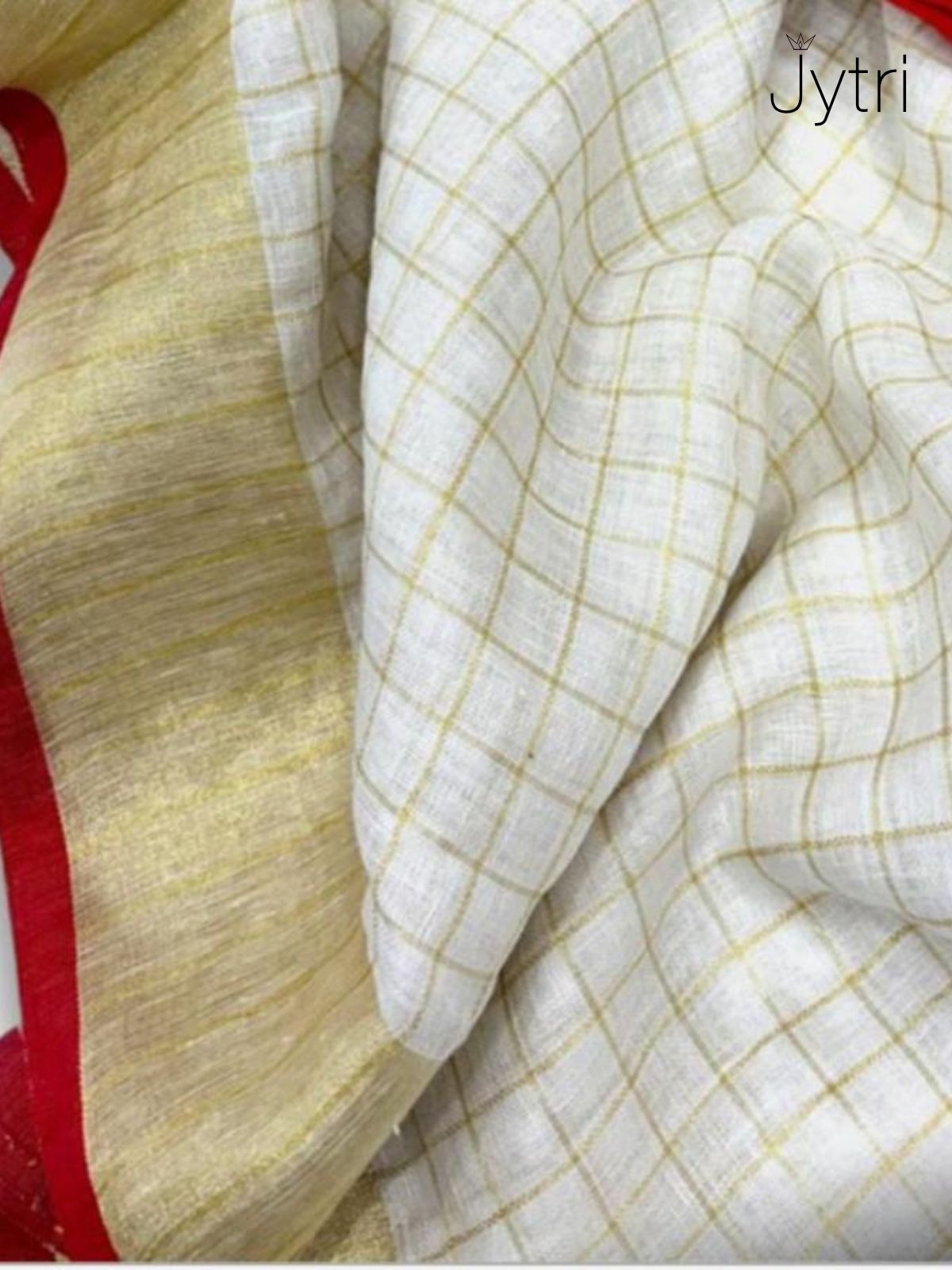 Elegant cream cotton saree with golden zari weaving and tassel pallu