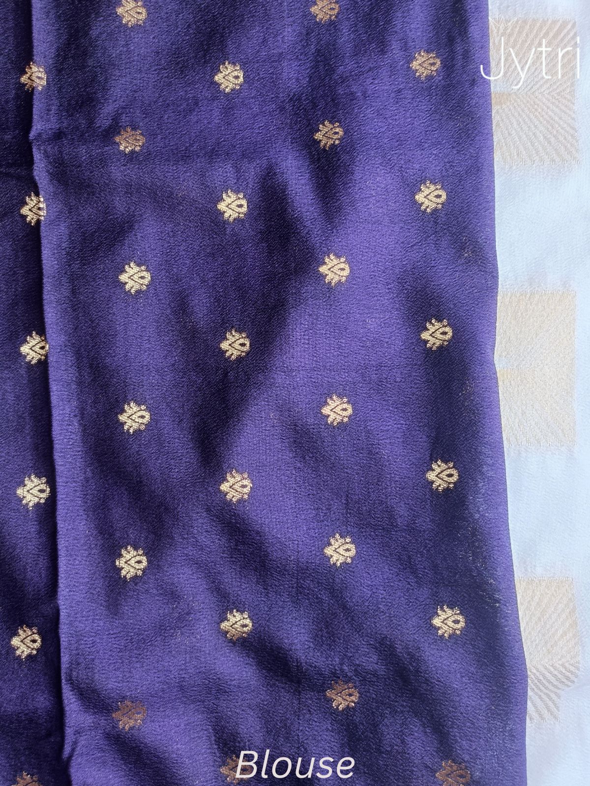 Off White Georgette Saree with Purple Blouse Piece