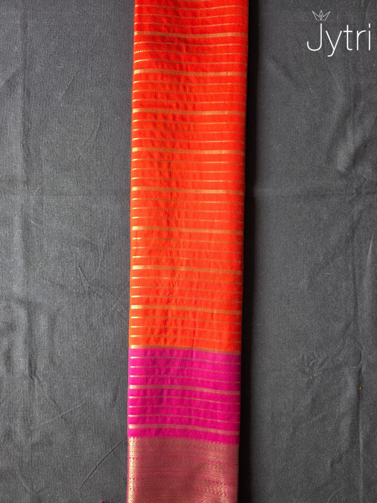 Orange Crepe Georgette Saree with Pink Border