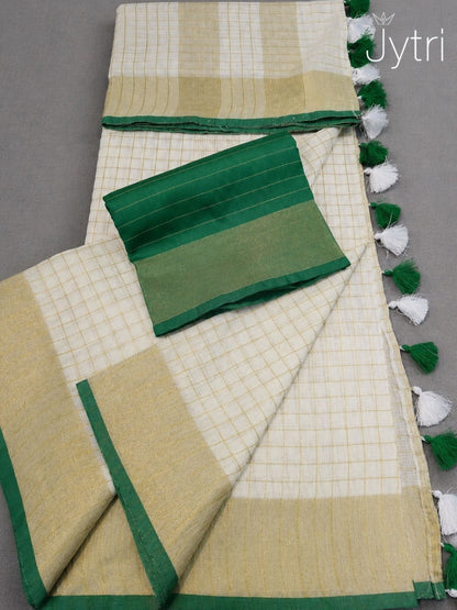 Elegant cream cotton saree with golden zari weaving and green border pallu