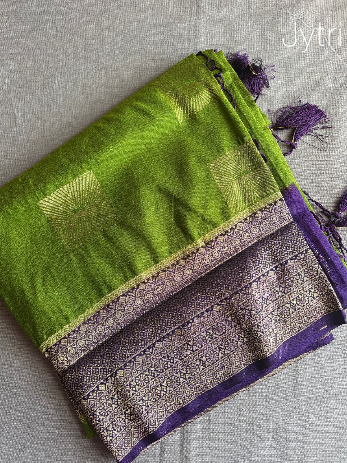 Green and purple saree with Zari Design