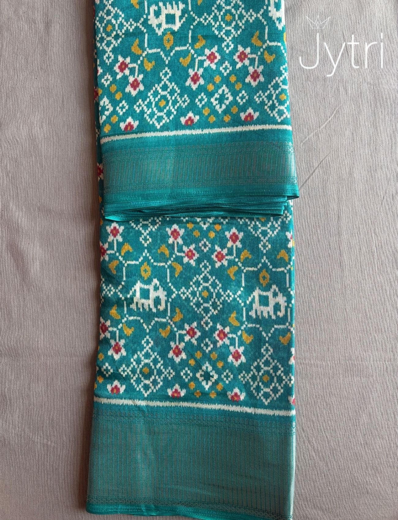 Teal Blue Ikat Print Saree
